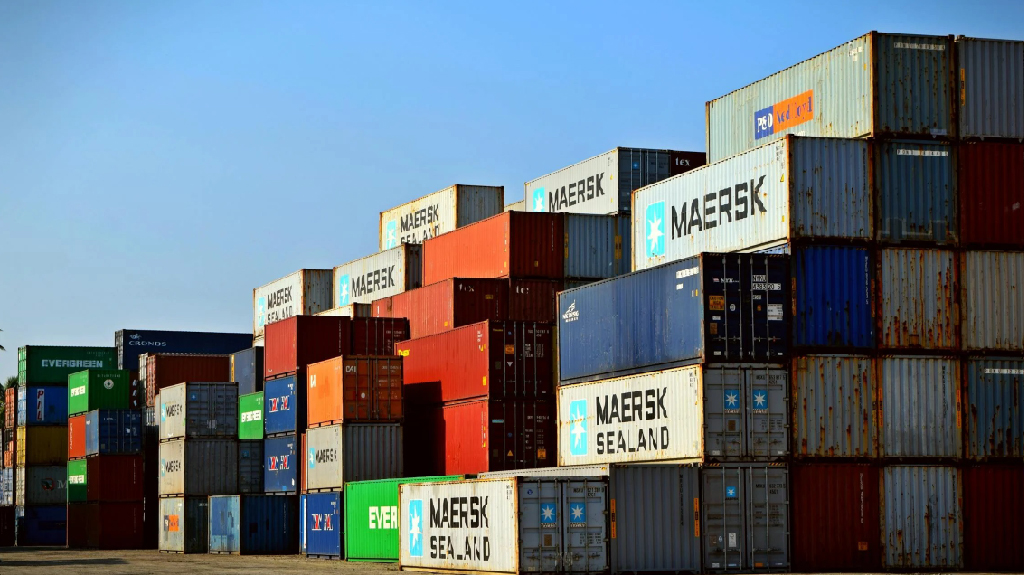 Shipping containers at port terminal awaiting sea freight customs clearance and custom clearance of export cargo by sea