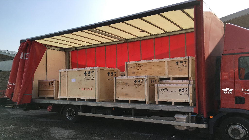Road haulage truck carrying commercial cargo for road freight customs clearance and UK import and export customs processing